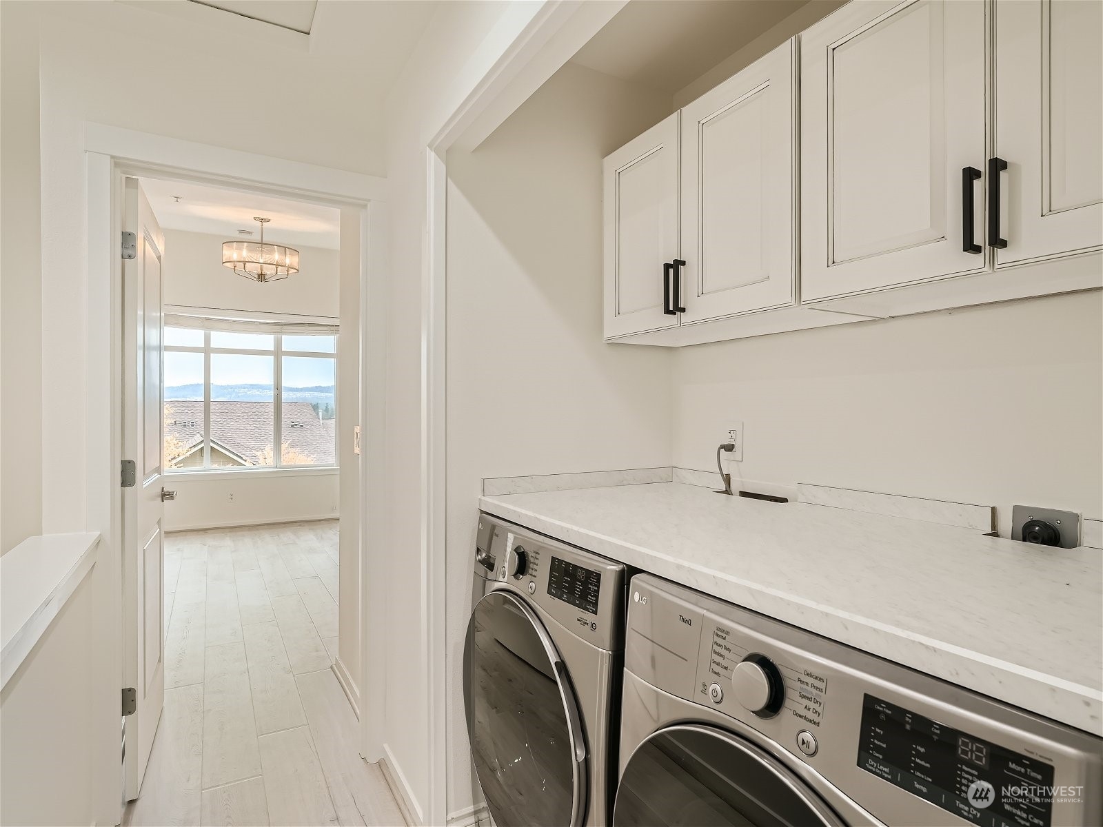 101 Sky Ridge Road Northwest, Unit 502 Issaquah, WA 98027 - Photo 20 of 31 a utility room with dryer and washer