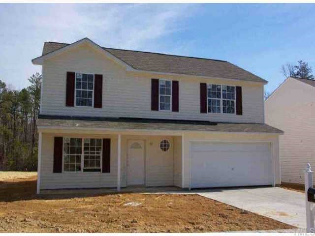 3905 Tyler Bluff Lane Raleigh, NC 27616 - Photo 1 of 1 a front view of a house