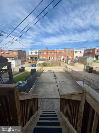 a view of a swimming pool and a yard