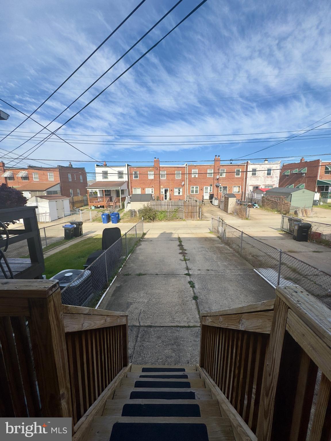 7716 Wynbrook Road Baltimore, MD 21224 - Photo 10 of 15 a view of a swimming pool and a yard