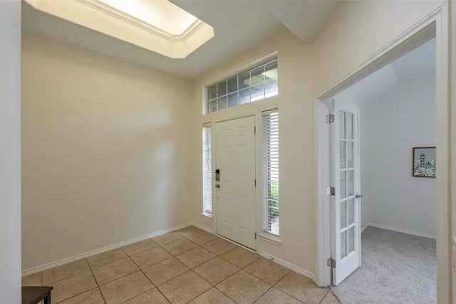 a view of livingroom with hardwood floor and a sink