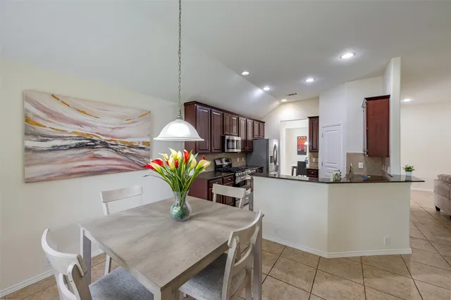 a view of living room and dining room