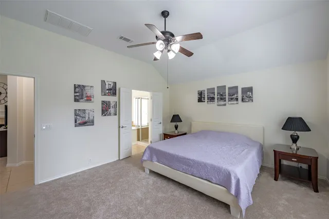 a spacious bathroom with a sink a mirror and a bathtub