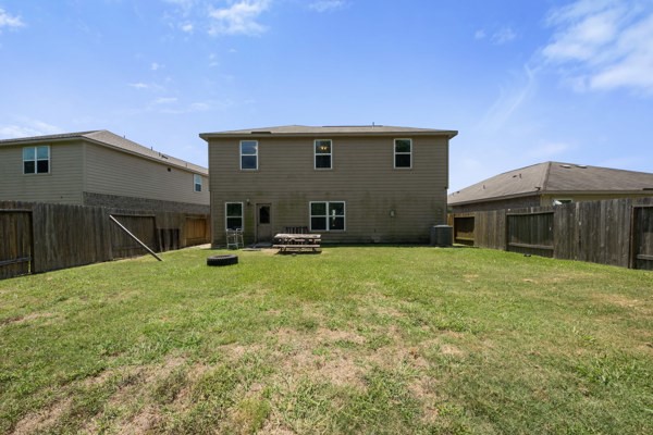 1327 Diamond Drape Drive Rosharon, TX 77583 - Photo 21 of 26 a backyard of a house with table and chairs