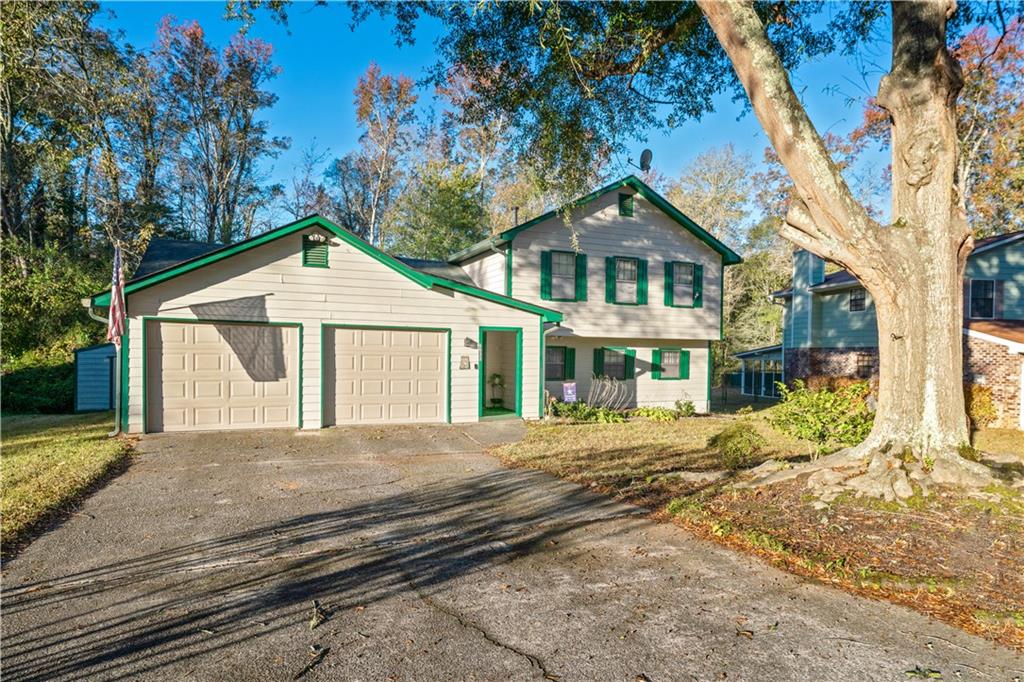 6633 Cameron Road Morrow, GA 30260 - Photo 1 of 41 a front view of a house with a yard