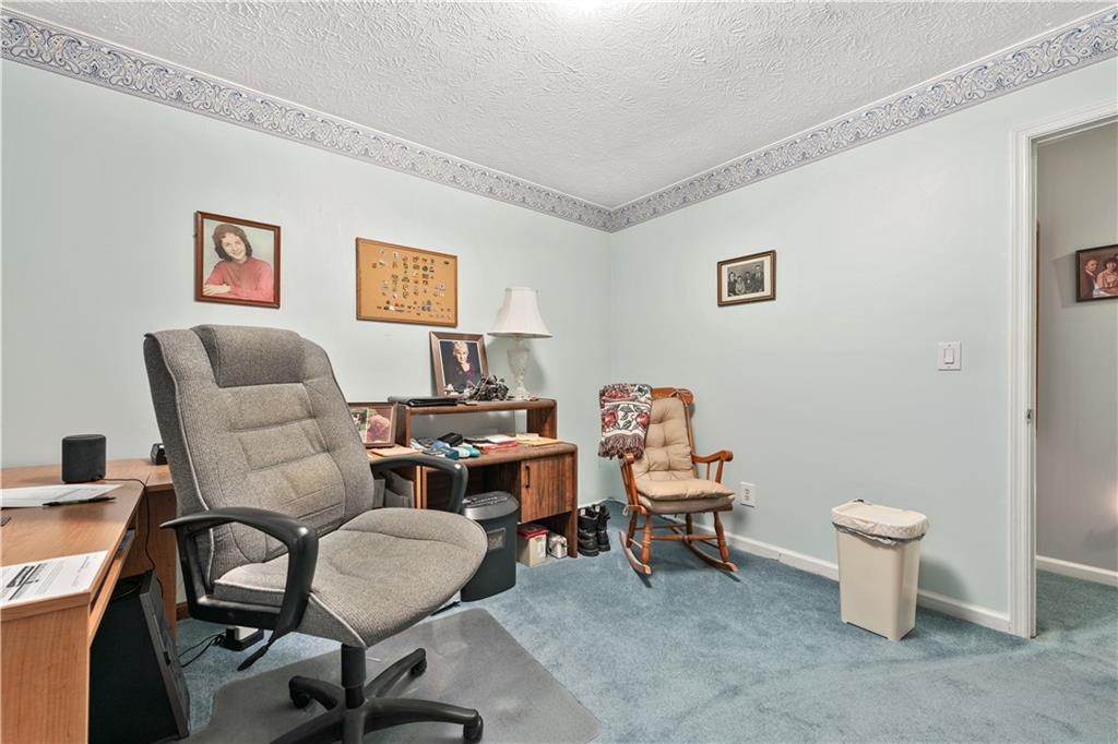 6633 Cameron Road Morrow, GA 30260 - Photo 20 of 41 a work room with furniture and a window