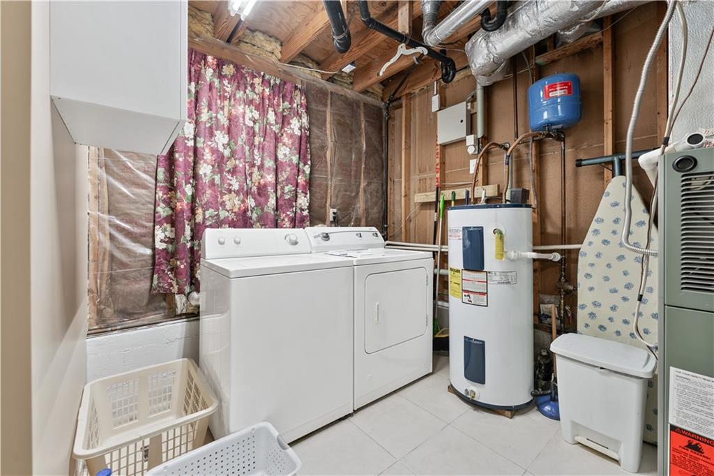 6633 Cameron Road Morrow, GA 30260 - Photo 22 of 41 a utility room with dryer and washer