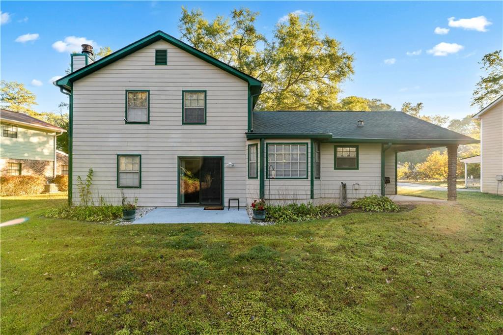 6633 Cameron Road Morrow, GA 30260 - Photo 25 of 41 a front view of a house with a yard
