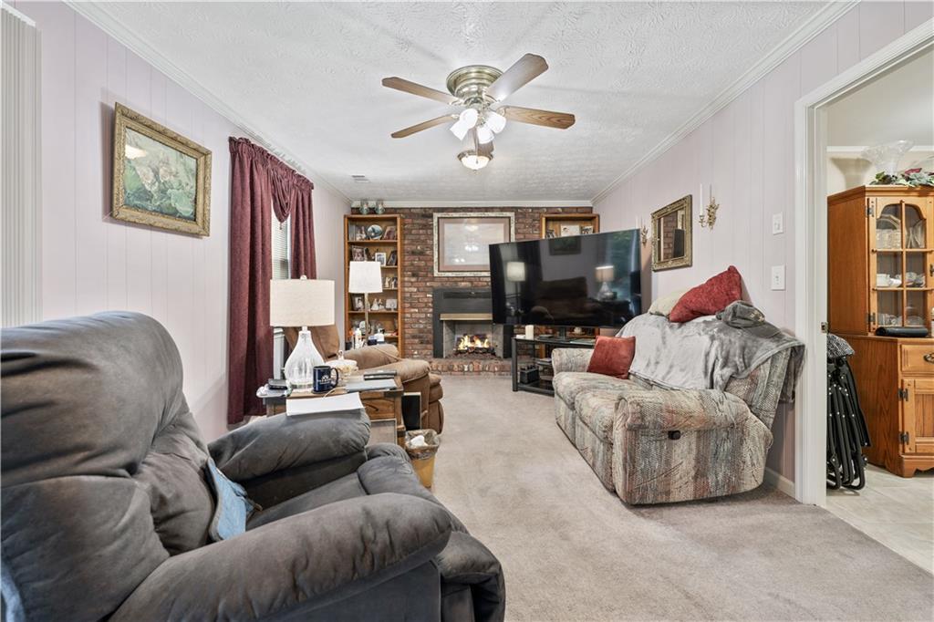 6633 Cameron Road Morrow, GA 30260 - Photo 3 of 41 a living room with furniture and ceiling fan