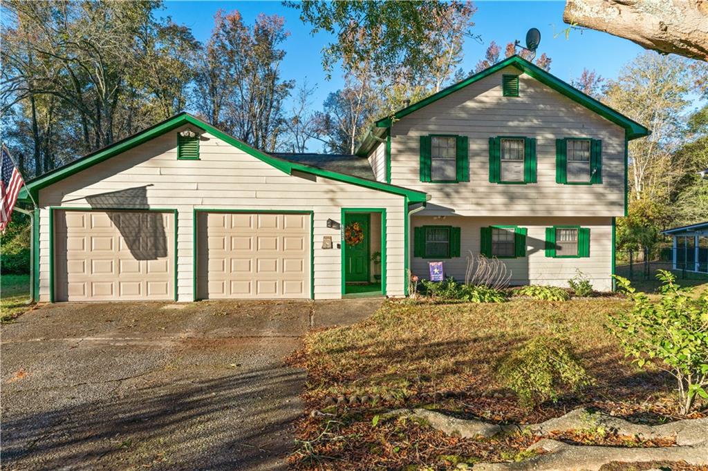 6633 Cameron Road Morrow, GA 30260 - Photo 34 of 41 a front view of a house with a yard