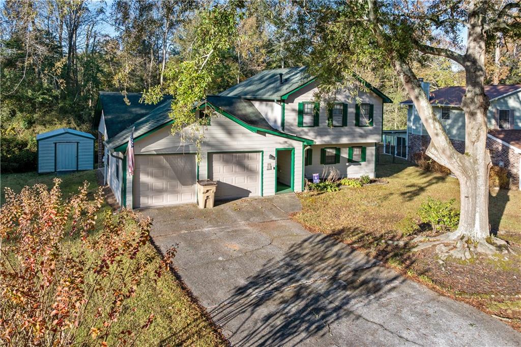 6633 Cameron Road Morrow, GA 30260 - Photo 37 of 41 a front view of a house with a yard