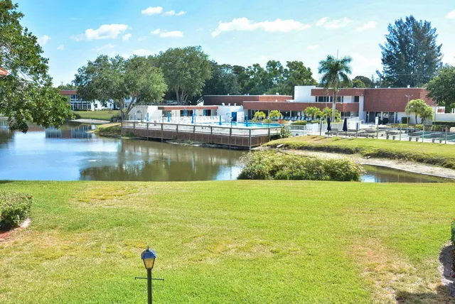 a view of a lake with a house