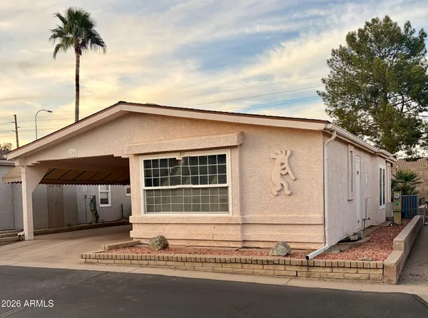 a house with a window and yard