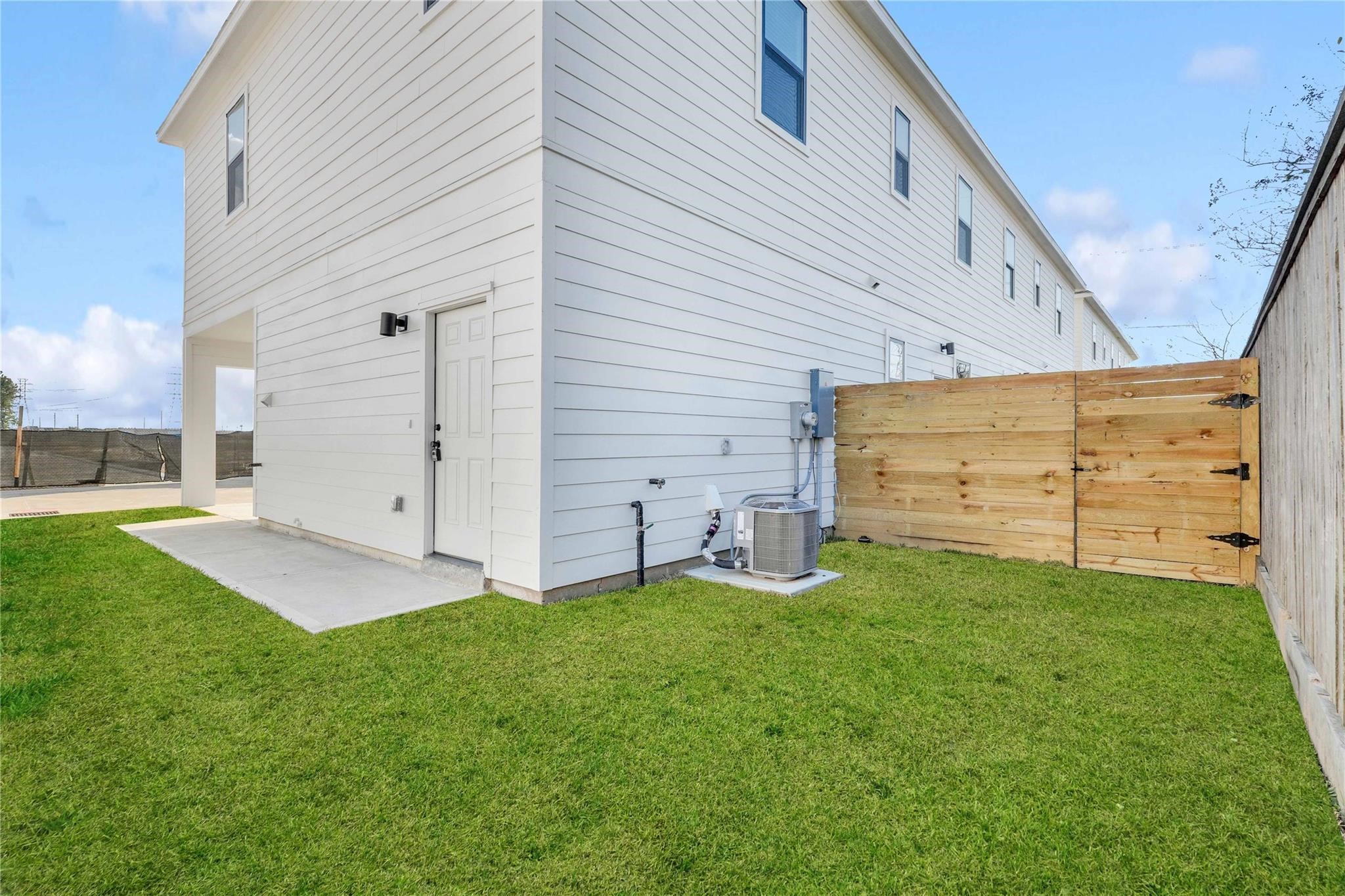 3210 Frying Pan Place, Unit A Katy, TX 77449 - Photo 38 of 39 a view of a backyard with plants