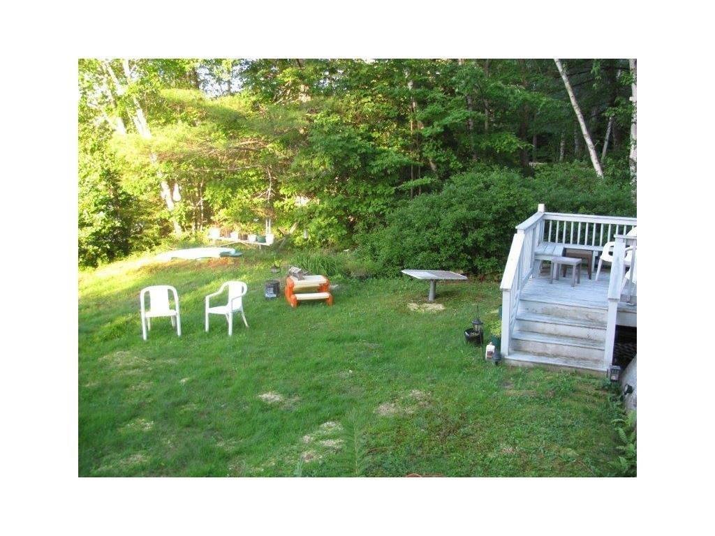 40 Plummer Drive Raymond, ME 04071 - Photo 7 of 30 Yard facing lake, We have several...