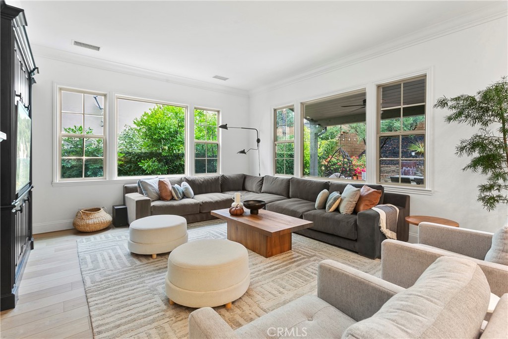 3 Adele Street Ladera Ranch, CA 92694 - Photo 19 of 34 a living room with furniture and a large window