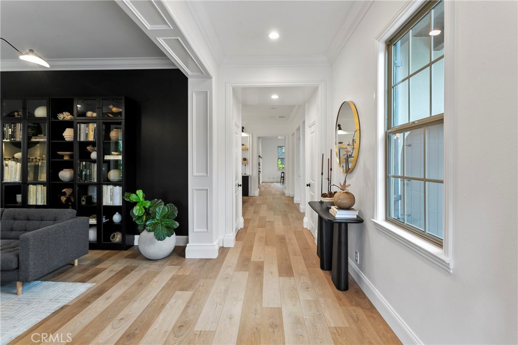 3 Adele Street Ladera Ranch, CA 92694 - Photo 2 of 34 a view of a living room with furniture and wooden floor