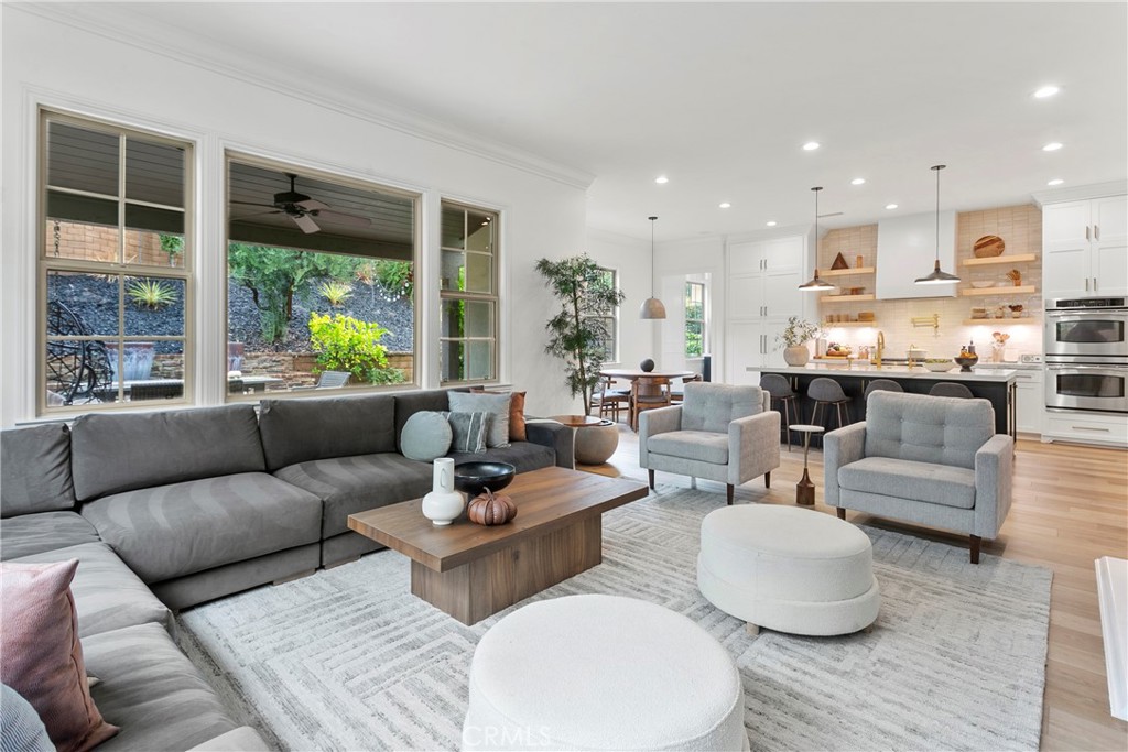 3 Adele Street Ladera Ranch, CA 92694 - Photo 21 of 34 a living room with furniture and a large window