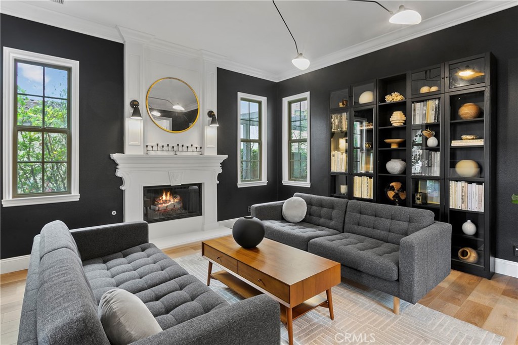 3 Adele Street Ladera Ranch, CA 92694 - Photo 3 of 34 a living room with furniture fireplace and window