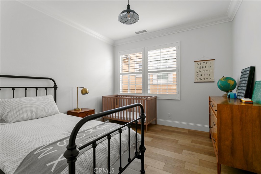 3 Adele Street Ladera Ranch, CA 92694 - Photo 31 of 34 a bedroom with a bed and a window