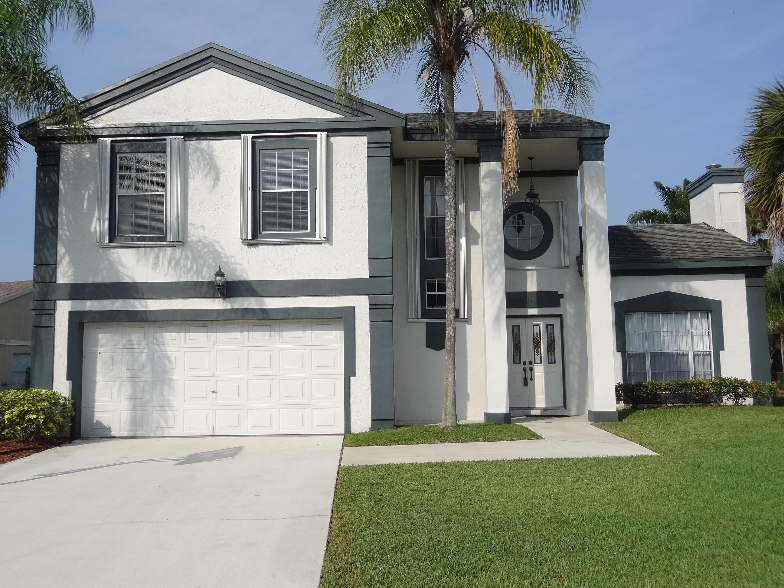 22099 Flower Drive Boca Raton, FL 33428 - Photo 1 of 25 FRONT ELEVATION