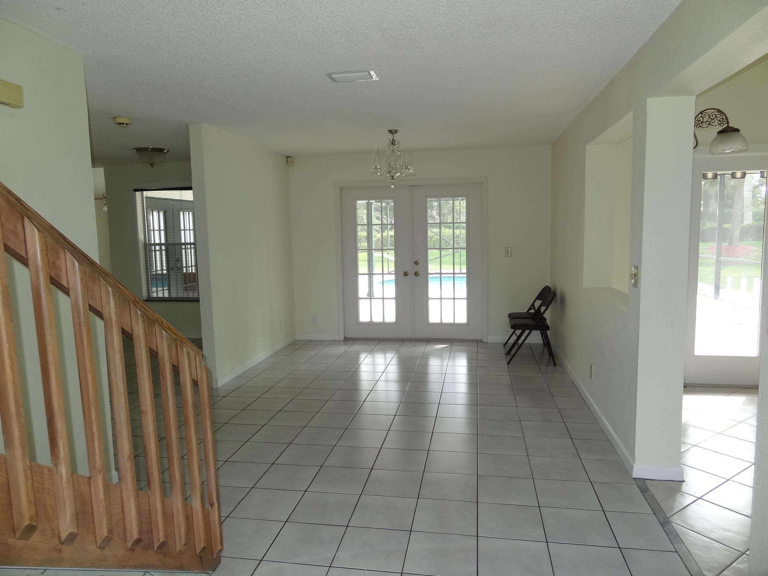 22099 Flower Drive Boca Raton, FL 33428 - Photo 16 of 25 ENTRY WAY TO FORMAL DINING ROOM