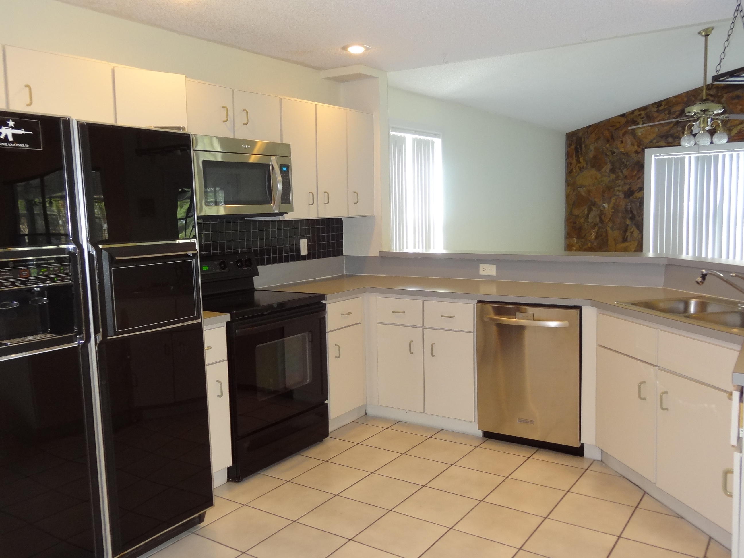 22099 Flower Drive Boca Raton, FL 33428 - Photo 5 of 25 LARGE OPEN KITCHEN TO FAMILY ROOM