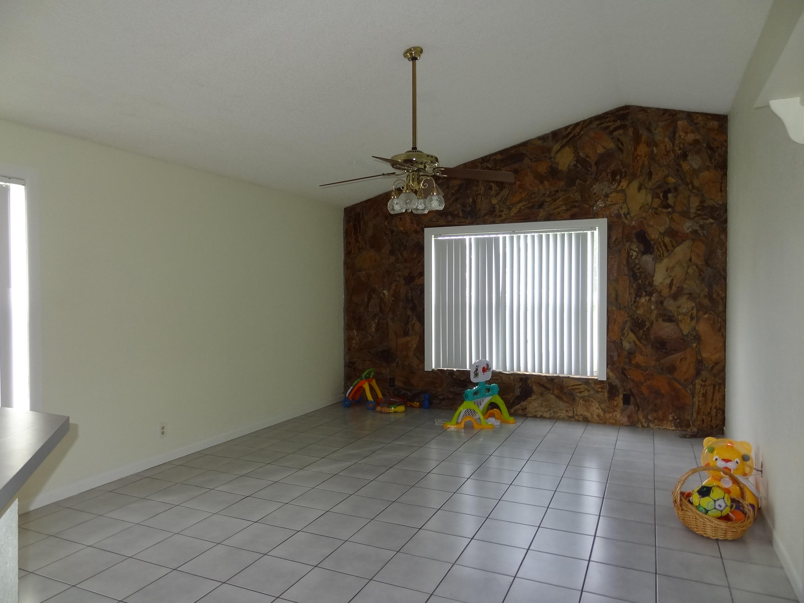22099 Flower Drive Boca Raton, FL 33428 - Photo 6 of 25 OVERSIZED FAMILY ROOM, OFF POOL AREA