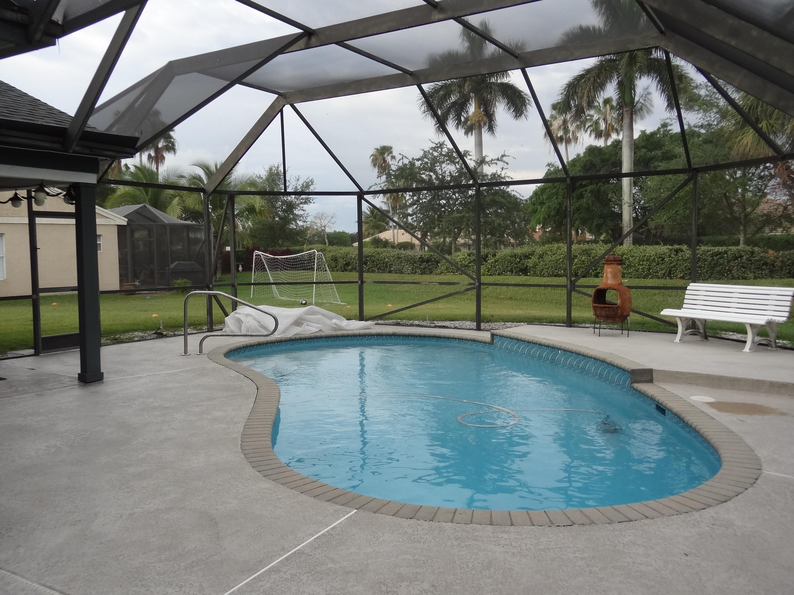 22099 Flower Drive Boca Raton, FL 33428 - Photo 8 of 25 LARGE DOME SCREENED POOL