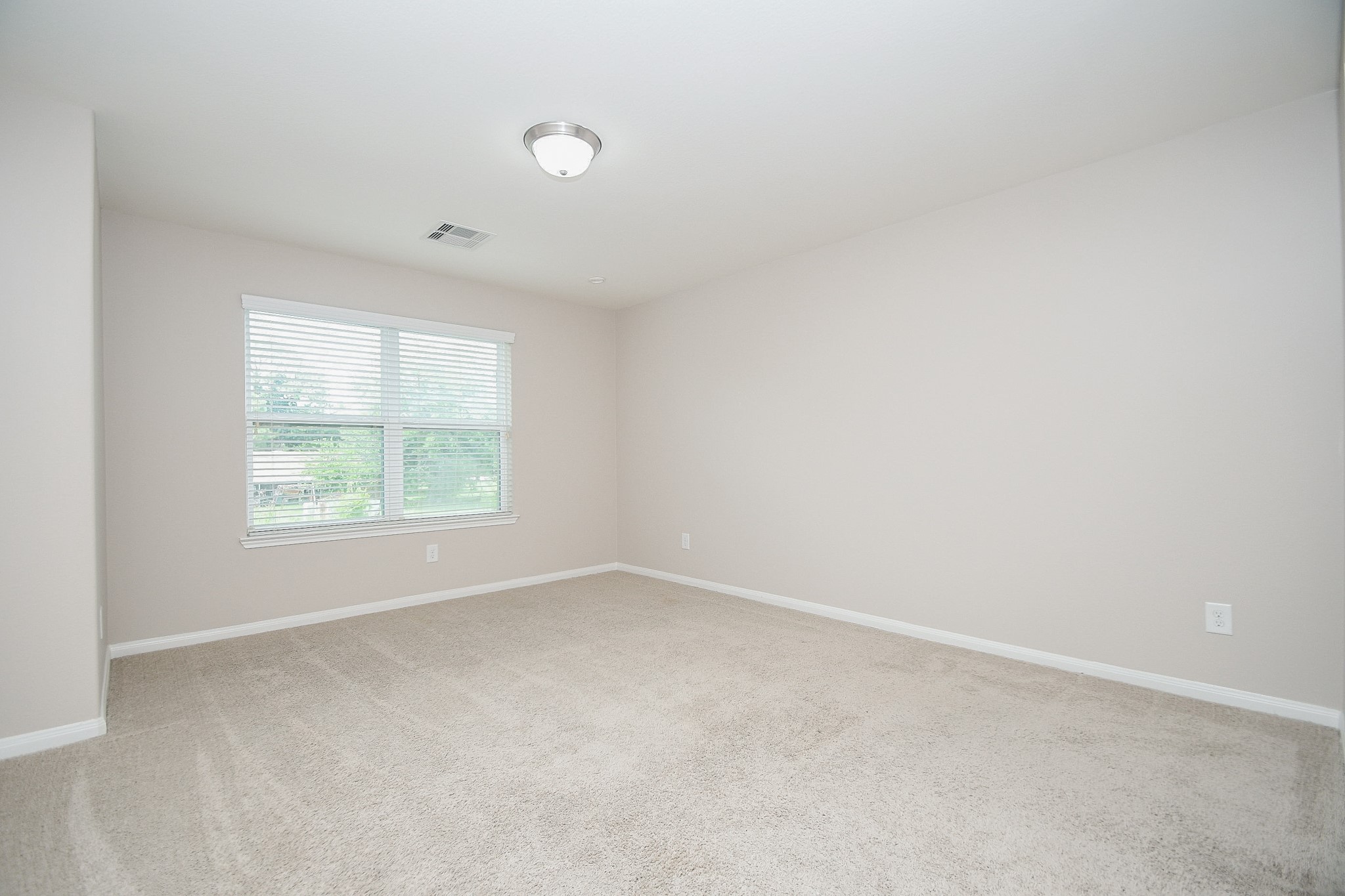 22139 Rustling Springs Drive Spring, TX 77389 - Photo 10 of 23 an empty room with windows