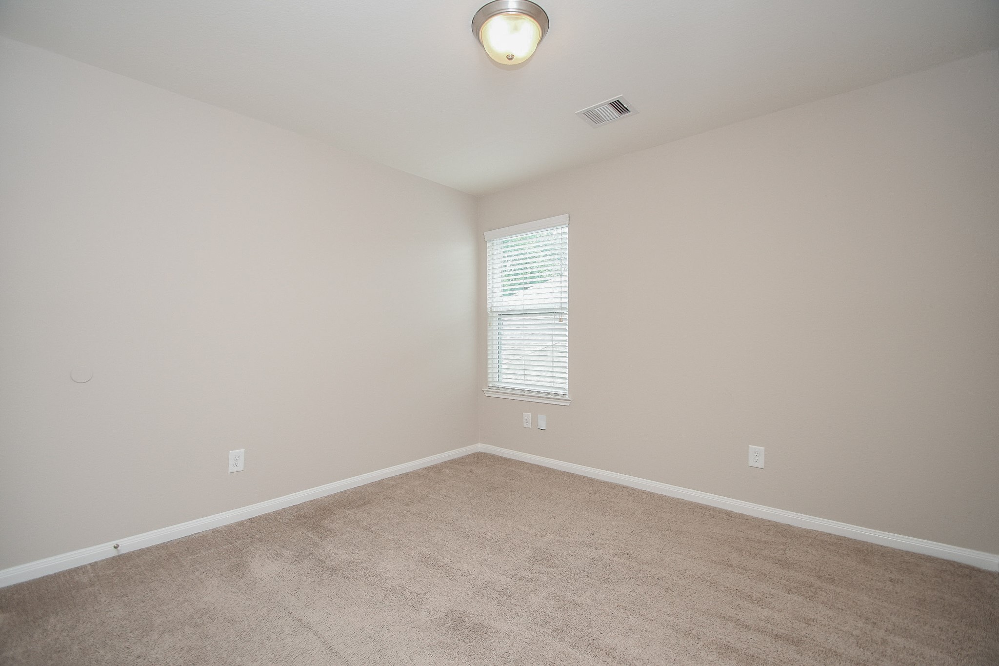 22139 Rustling Springs Drive Spring, TX 77389 - Photo 12 of 23 an empty room with a empty space and window