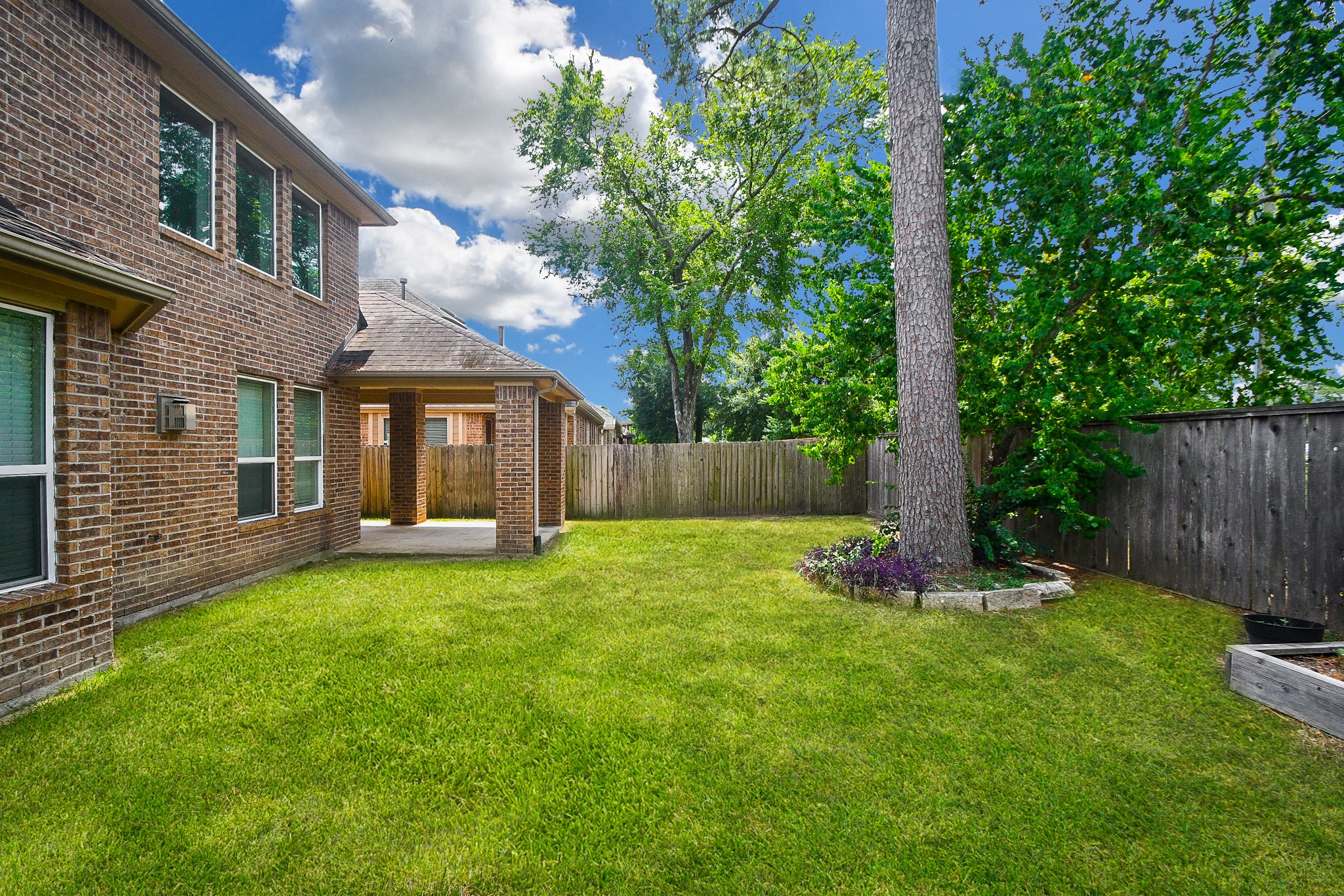 22139 Rustling Springs Drive Spring, TX 77389 - Photo 19 of 23 a view of a house with a yard and sitting area