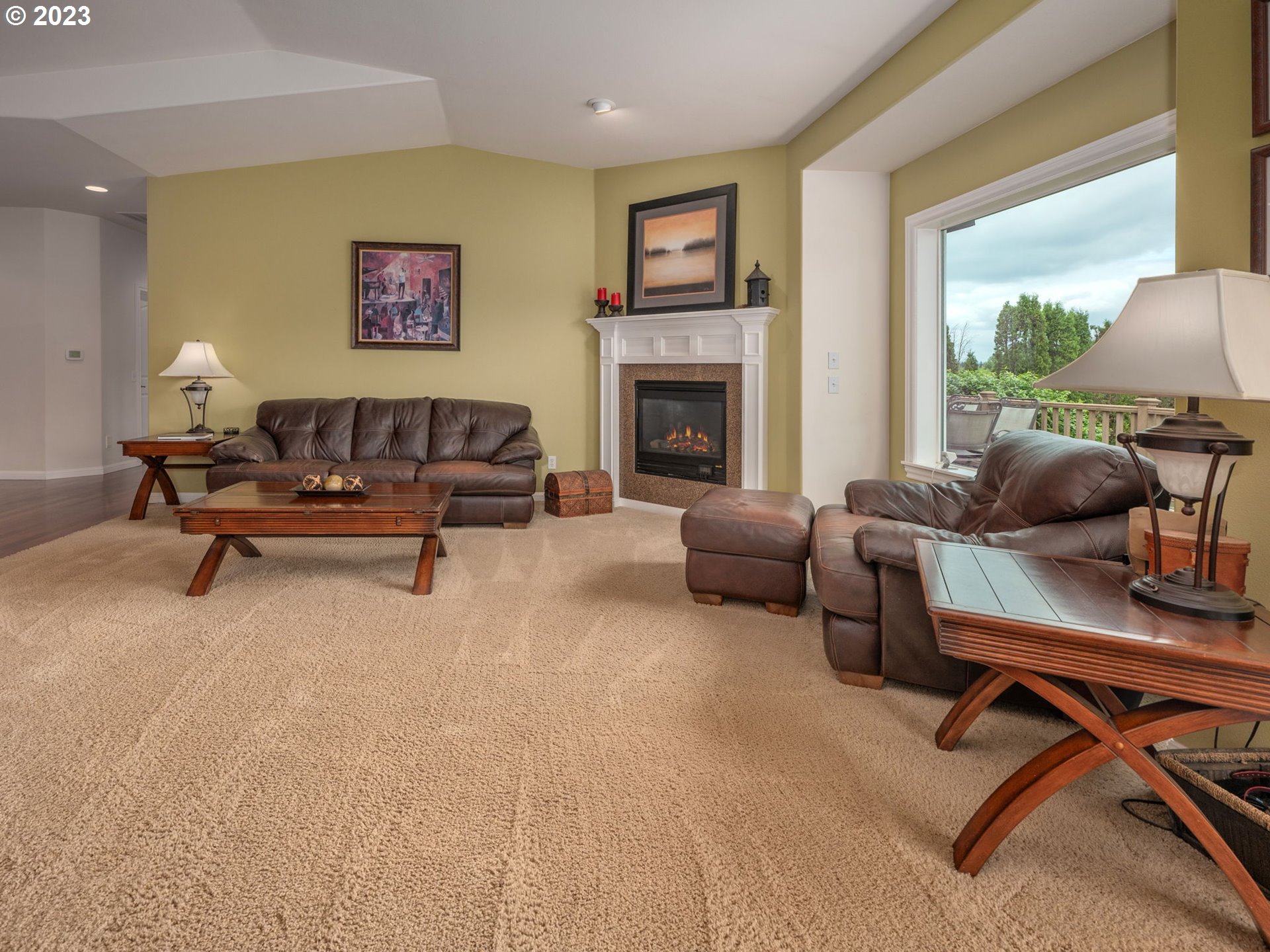 56470 Hazen Road Warren, OR 97053 - Photo 19 of 39 a living room with furniture and a fireplace