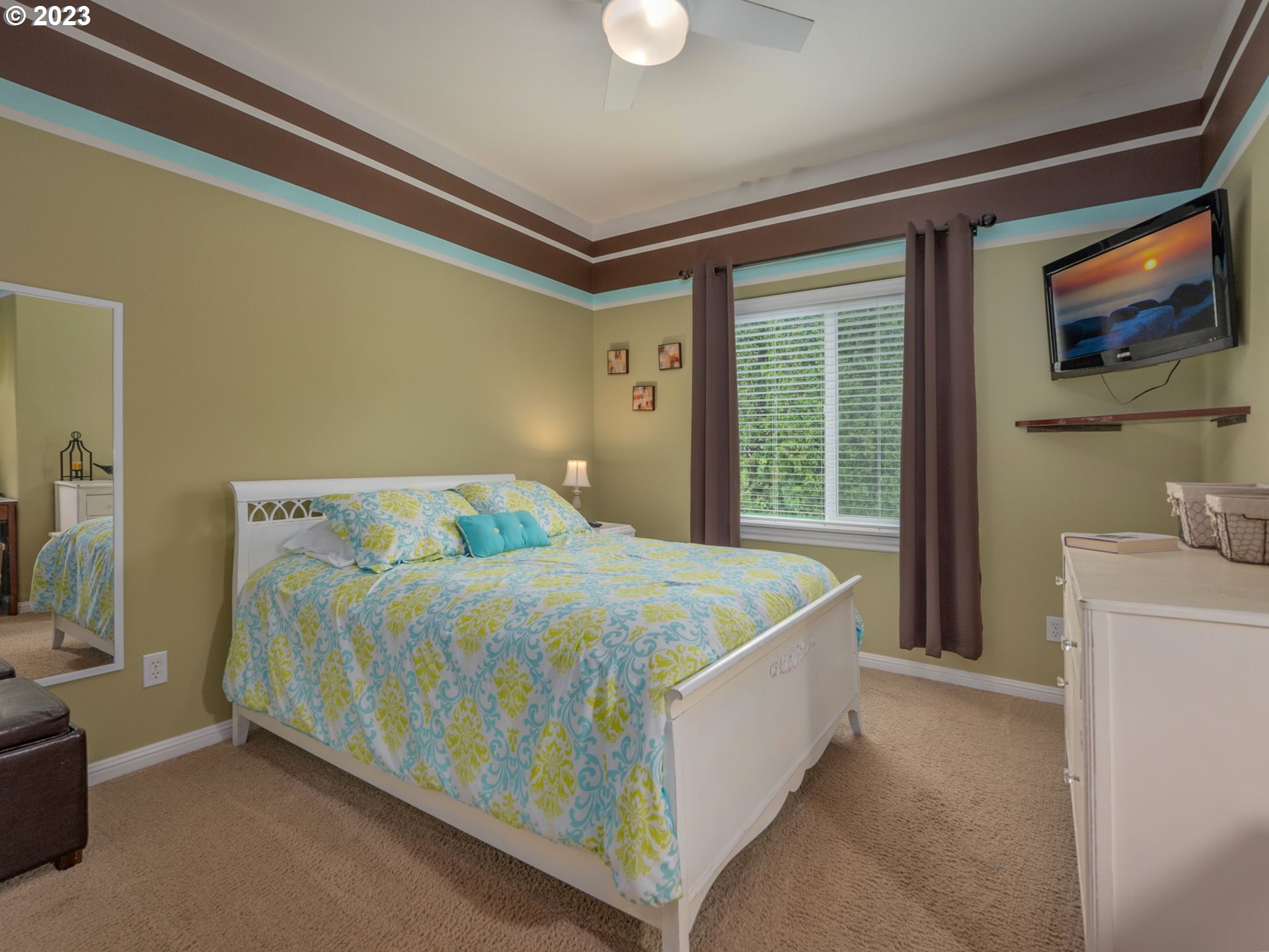 56470 Hazen Road Warren, OR 97053 - Photo 24 of 39 a bed sitting in a room next to a window