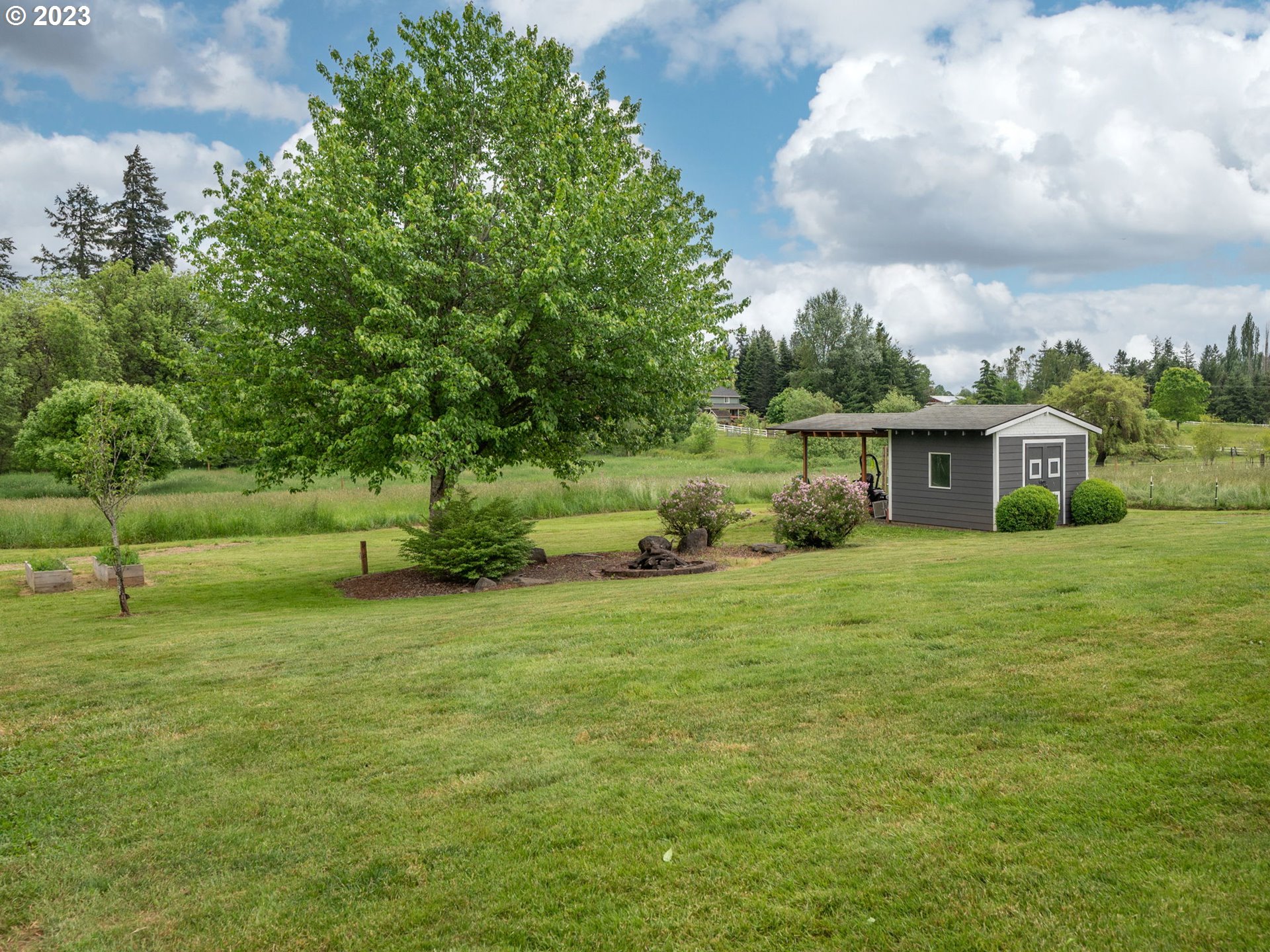 56470 Hazen Road Warren, OR 97053 - Photo 32 of 39 a front view of a house with a yard