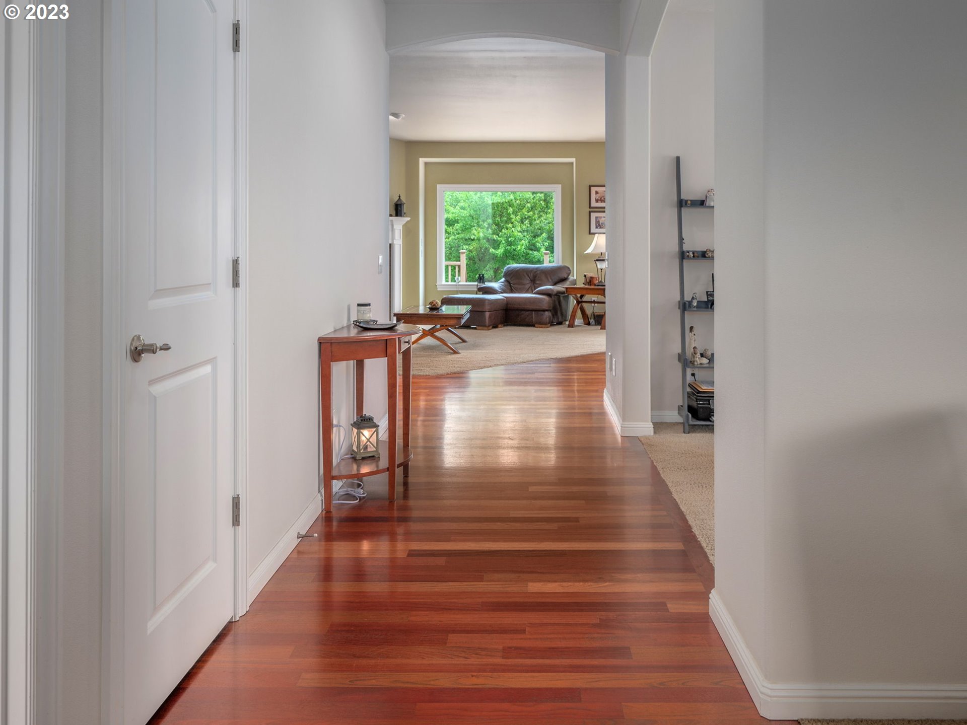 56470 Hazen Road Warren, OR 97053 - Photo 5 of 39 a view of a livingroom with hardwood floor and a hallway