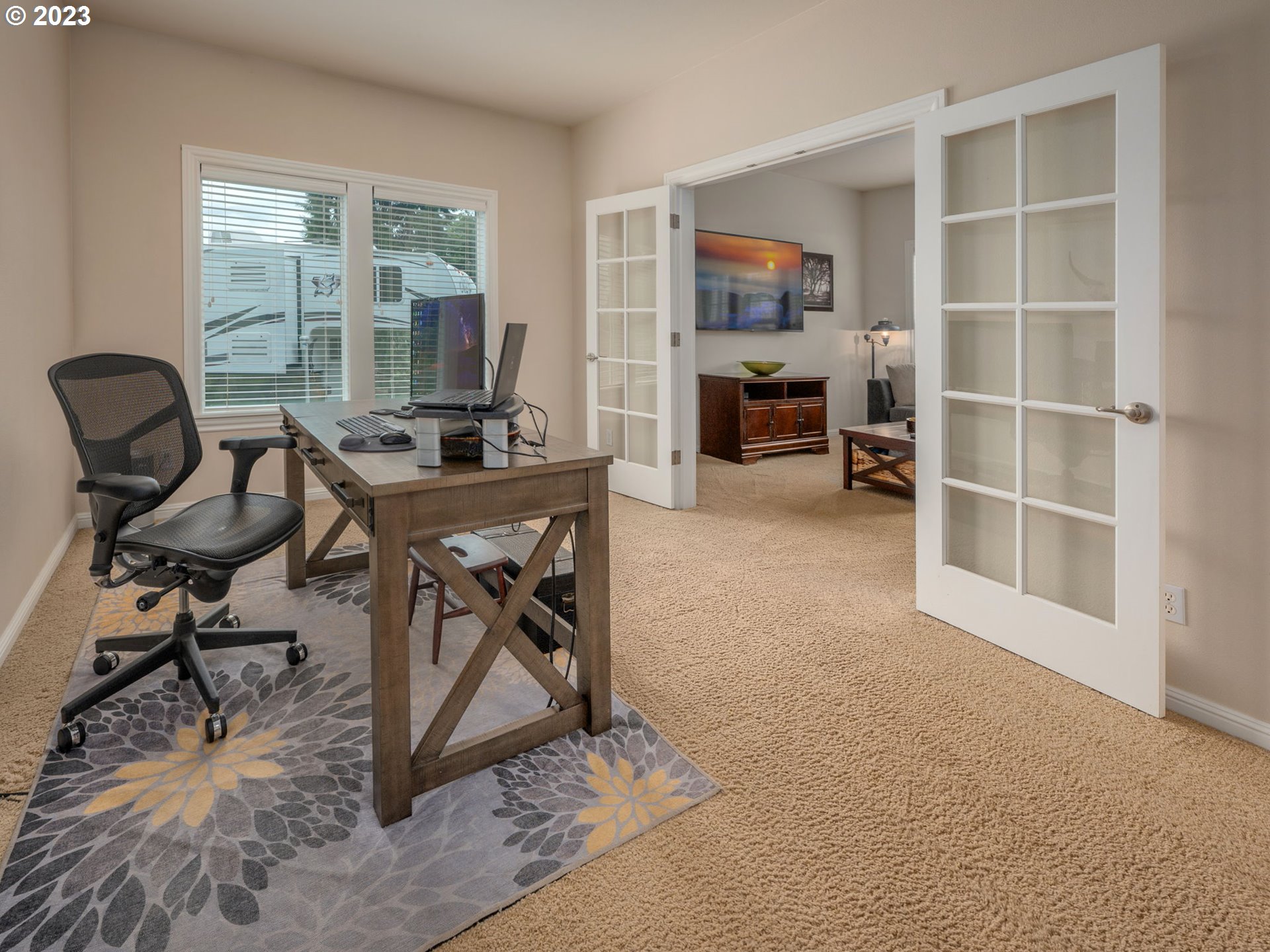 56470 Hazen Road Warren, OR 97053 - Photo 8 of 39 a view of a workspace with furniture and a window