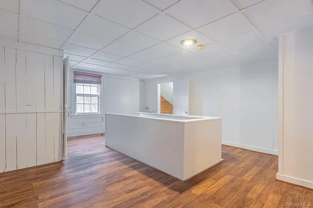 a view of livingroom with hardwood and window