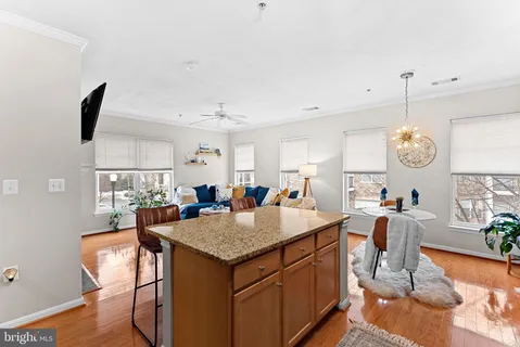 a view of a kitchen and dining table