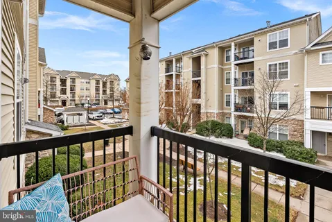 a view of a street from a balcony