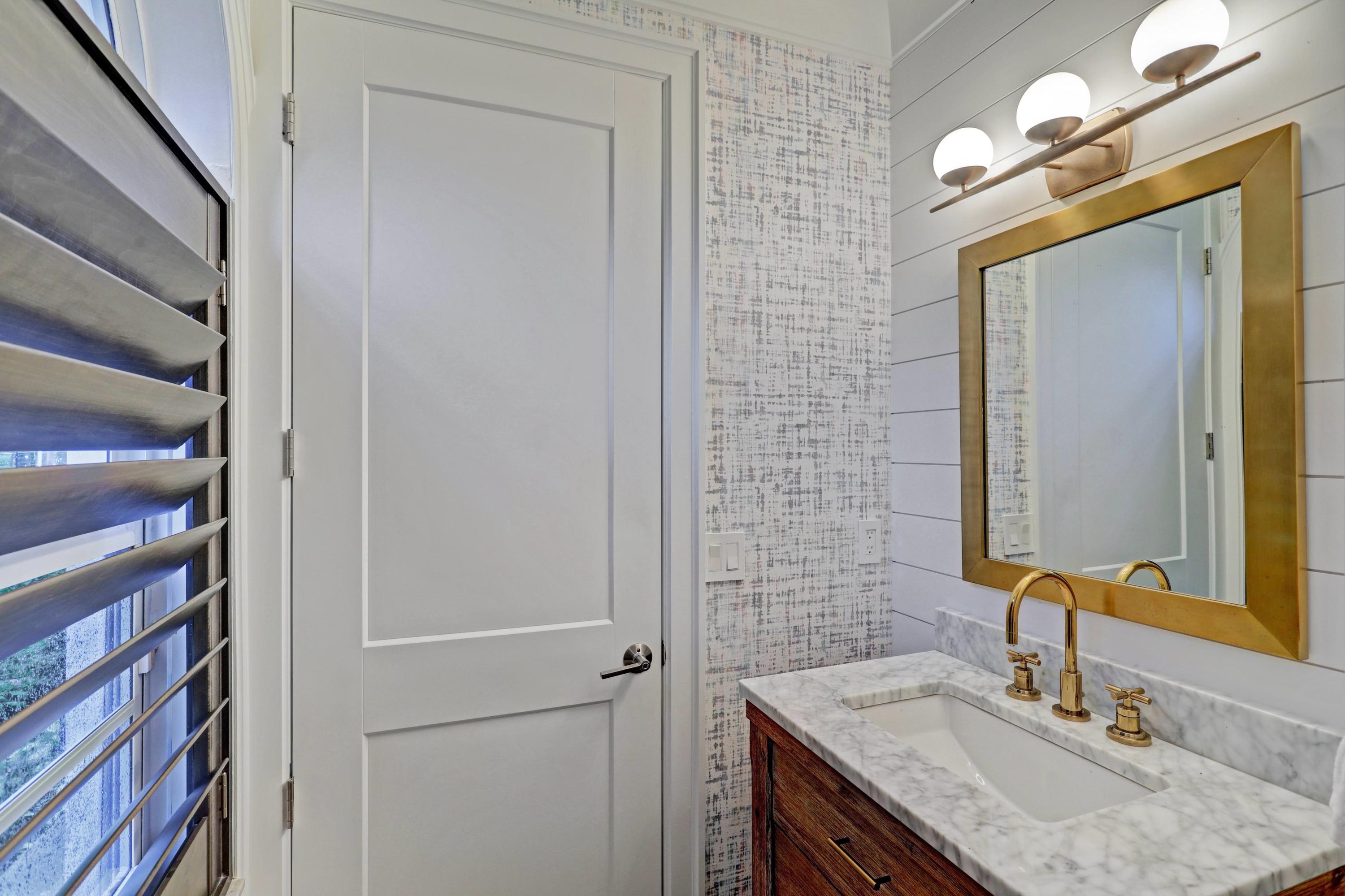 107 Barcelona Drive Jupiter, FL 33458 - Photo 34 of 73 First Floor Guest Bath