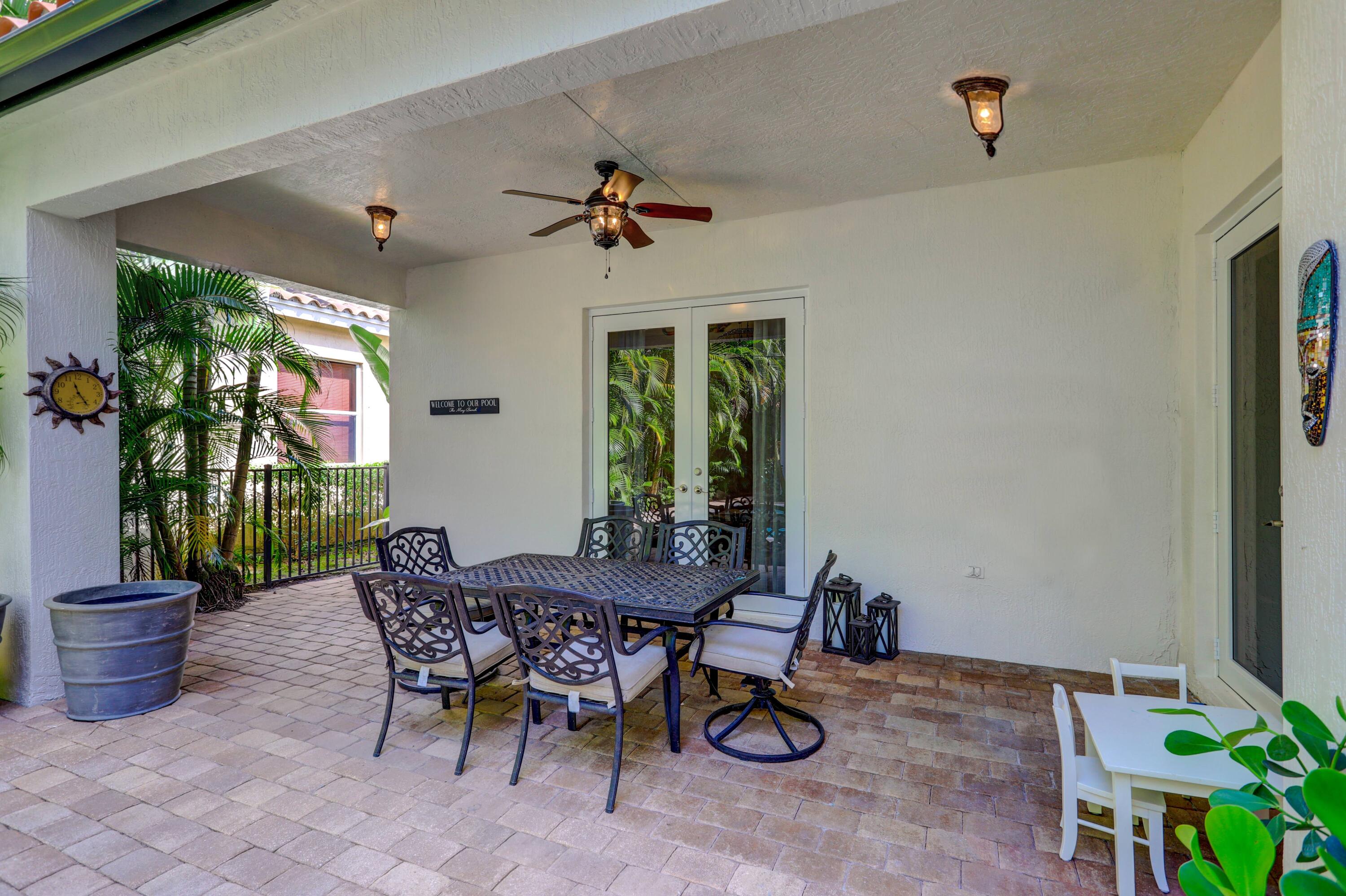 107 Barcelona Drive Jupiter, FL 33458 - Photo 55 of 73 Back Covered Porch