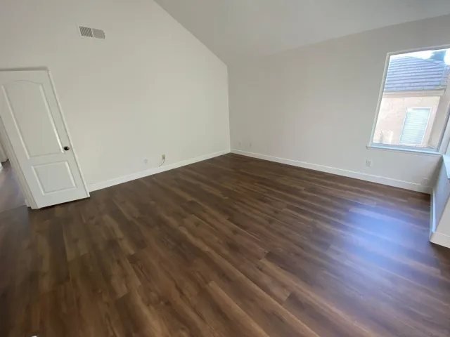 a bathroom with a sink a mirror and a bathtub
