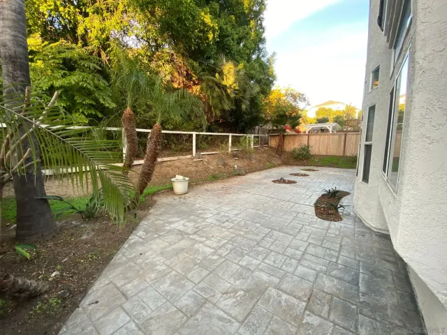 a view of a street with a building in the background