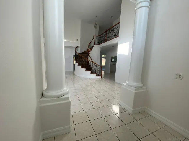 a view of an entryway with stairs