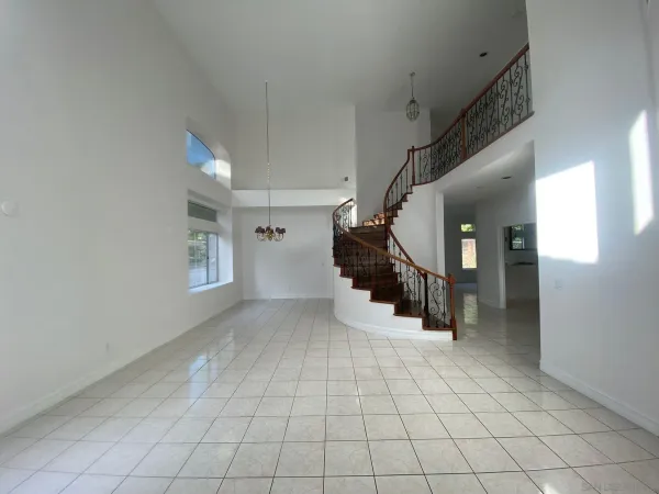 a view of entryway and hall with a window