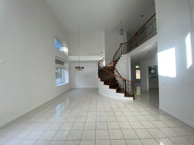 a view of entryway and hall with a window
