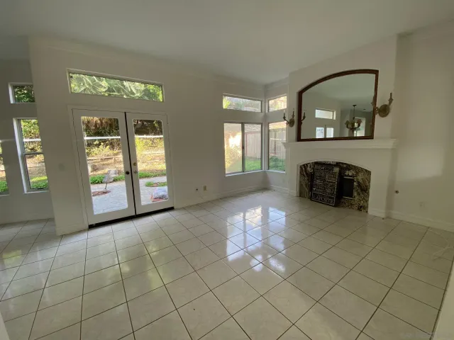 a close view of walk in closet with empty racks
