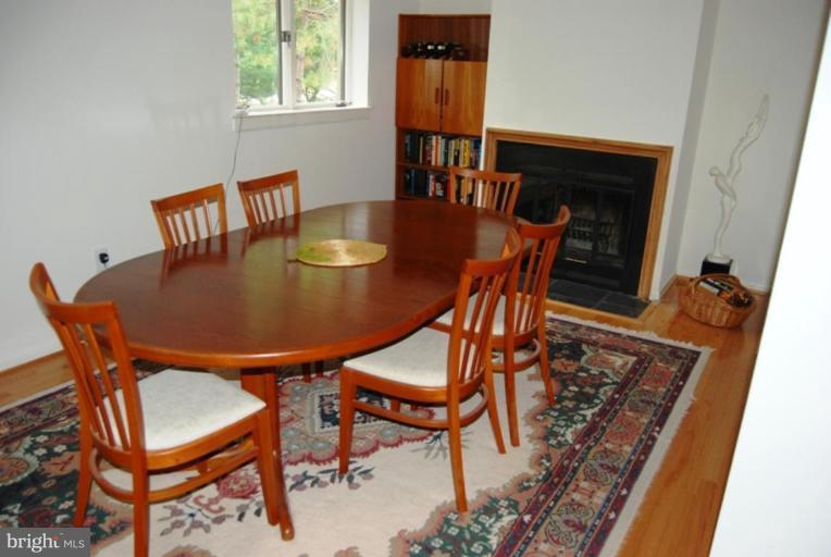 7504 Rolling Road Springfield, VA 22153 - Photo 22 of 26 a dining room with furniture and window