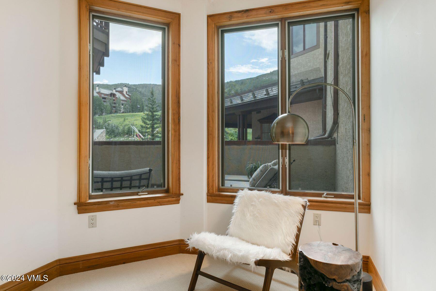 15 West Thomas Place, Unit R44 Beaver Creek, CO 81620 - Photo 15 of 21 a room with two chairs and a window
